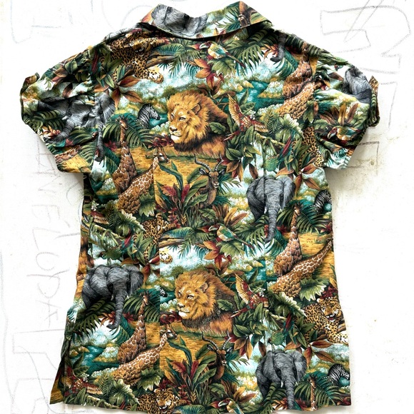 Green and brown jungle safari blouse with animal figures print. - Picture 7 of 8